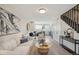 Spacious living room with an open floor plan, looking toward the kitchen at 4336 Decatur St, Denver, CO 80211