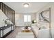 Living area with modern staircase and comfortable seating at 4336 Decatur St, Denver, CO 80211