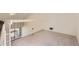 Bright room with sloped ceiling and view to exterior at 3558 S Depew St # 302, Denver, CO 80235