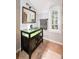 Bathroom featuring unique sink, mirror, window, and tile floors at 1502 Columbine Ave, Boulder, CO 80302