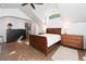 Bedroom with hardwood floors, lots of light, vaulted ceiling, and furniture at 1502 Columbine Ave, Boulder, CO 80302