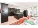 Stylish kitchen with sleek cabinetry, stone countertops, and eat-in dining area at 1502 Columbine Ave, Boulder, CO 80302