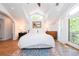 Spacious main bedroom with vaulted ceilings, natural light, and balcony access at 1502 Columbine Ave, Boulder, CO 80302