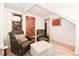 Cozy sitting area with comfortable chairs, natural light, and hardwood floors at 1502 Columbine Ave, Boulder, CO 80302