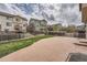 Large stamped concrete patio in fenced backyard is perfect for outdoor entertaining at 24288 E Brandt Ave, Aurora, CO 80016