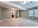 Spacious basement area with carpet, closet, and attached bathroom offers flexible living space at 24288 E Brandt Ave, Aurora, CO 80016