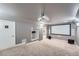 Finished basement theater with plush carpeting and a projector with screen at 24288 E Brandt Ave, Aurora, CO 80016