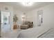 Bright bedroom with sitting area and ensuite bathroom access, perfect for relaxing at 5737 Amarosa Dr, Parker, CO 80134