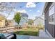 Cozy backyard featuring a well-maintained lawn, patio and nice landscaping at 2879 Shadow Lake Rd, Lafayette, CO 80026