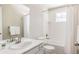 Well-lit bathroom featuring a shower-tub combo with white subway tile and modern fixtures at 2879 Shadow Lake Rd, Lafayette, CO 80026