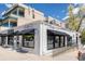 Street-level view of Thunderbird Barbers with large picture windows and awnings and street-level access at 2879 Shadow Lake Rd, Lafayette, CO 80026