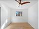 Spacious bedroom with hardwood floors and a ceiling fan at 385 32Nd St, Boulder, CO 80305