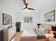 Light and airy bedroom with ceiling fan and large window at 385 32Nd St, Boulder, CO 80305