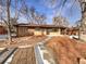 Ranch home with stone accents and updated landscaping at 385 32Nd St, Boulder, CO 80305