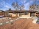 Ranch style home with updated landscaping and walkway at 385 32Nd St, Boulder, CO 80305