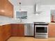 Updated kitchen with stainless steel appliances and marble backsplash at 385 32Nd St, Boulder, CO 80305