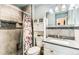 Bathroom with a walk-in shower and tiled surround at 10826 Claire Ln, Northglenn, CO 80234