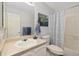 Cozy bathroom with a shower/tub combination, neutral tones, and ample mirror space at 16753 W 61St Ln, Golden, CO 80403