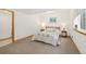 Basement bedroom featuring neutral carpet, natural light, and a view of the outside at 16753 W 61St Ln, Golden, CO 80403