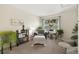 Cozy sitting room with a comfortable chair, natural light, and decor at 16753 W 61St Ln, Golden, CO 80403