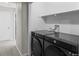 Convenient laundry room area with newer washer and dryer at 10693 W 63Rd Dr # 106, Arvada, CO 80004