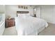 Well-lit bedroom with a queen-size bed and nightstand at 2686 E Otero Pl # 12, Centennial, CO 80122