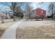 Exterior view of the community, showcasing a pathway and well-maintained landscaping at 2686 E Otero Pl # 12, Centennial, CO 80122