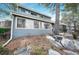 House exterior with large windows and rock landscaping at 2686 E Otero Pl # 12, Centennial, CO 80122