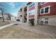 Red brick building exterior with stairs and landscaping at 2686 E Otero Pl # 12, Centennial, CO 80122