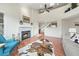 Living room with hardwood floors, fireplace, and loft view at 2686 E Otero Pl # 12, Centennial, CO 80122