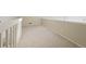 Loft bedroom with carpet and white railings at 2686 E Otero Pl # 12, Centennial, CO 80122