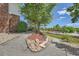 An attractively landscaped side yard features stone mulch and gravel along a walkway at 11410 W 72Nd Pl, Arvada, CO 80005