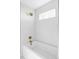 Bright bathroom with combination tub/shower and contemporary fixtures at 1683 N Zenobia St, Denver, CO 80204