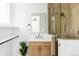 Modern bathroom featuring a vanity with storage, and a sleek shower at 1683 N Zenobia St, Denver, CO 80204