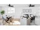 Open living area with modern decor, hardwood floors, and a large window for natural light at 1683 N Zenobia St, Denver, CO 80204