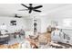 Bright living room with modern furnishings, hardwood floors, and abundant natural light at 1683 N Zenobia St, Denver, CO 80204