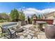 Backyard featuring an outdoor stone cooking area and patio seating at 821 S 34Th Ave, Brighton, CO 80601