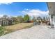 Spacious backyard featuring a stone patio, storage shed, outdoor dining area, and lush greenery at 821 S 34Th Ave, Brighton, CO 80601
