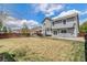 Expansive backyard with lawn, patio, barbeque, and bench, perfect for relaxation and entertaining at 821 S 34Th Ave, Brighton, CO 80601