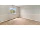Light filled bedroom with carpet, and a window offering natural light at 821 S 34Th Ave, Brighton, CO 80601