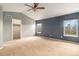 Spacious bedroom featuring two windows and access to the walk-in closet at 821 S 34Th Ave, Brighton, CO 80601