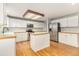 Well-equipped kitchen with island, stainless steel appliances, and ample cabinet space at 821 S 34Th Ave, Brighton, CO 80601