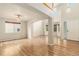 Open-concept living room with hardwood floors and lots of natural light at 821 S 34Th Ave, Brighton, CO 80601