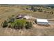 Sprawling property with a charming home, large workshop, and picturesque views of rolling hills at 1143 Belgian Trl, Elizabeth, CO 80107
