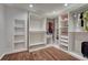 Walk-in closet featuring custom shelving and storage solutions at 1143 Belgian Trl, Elizabeth, CO 80107