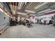The garage boasts high ceilings, ample lighting, and plenty of room for vehicles at 1143 Belgian Trl, Elizabeth, CO 80107