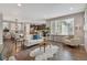 Inviting living room featuring an open floor plan with hardwood floors and lots of natural light at 540 E Fremont Pl, Centennial, CO 80122