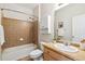 Full bathroom with tub, shower, vanity and plenty of storage at 14247 W 84Th Cir # A, Arvada, CO 80005