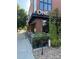 Charming building facade with an inviting entrance, enhanced by beautiful landscaping at 14247 W 84Th Cir # A, Arvada, CO 80005