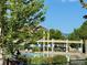 Resort-style community pool featuring sun loungers and pristine waters at 14247 W 84Th Cir # A, Arvada, CO 80005